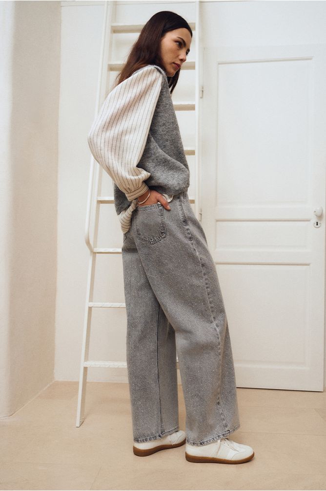 Flared jeans, studded with rhinestones