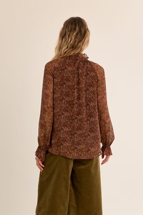 Semi-transparent floral blouse