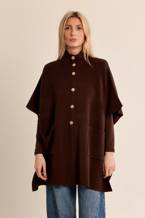 Knitted cape, buttoned