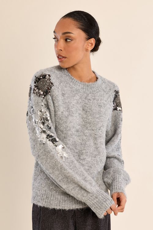 Rhinestone sweater on the sleeves