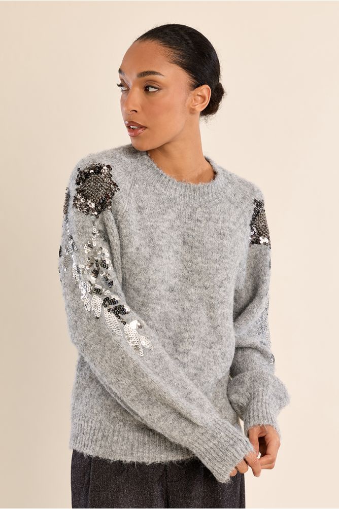 Rhinestone sweater on the sleeves