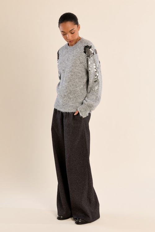 Rhinestone sweater on the sleeves