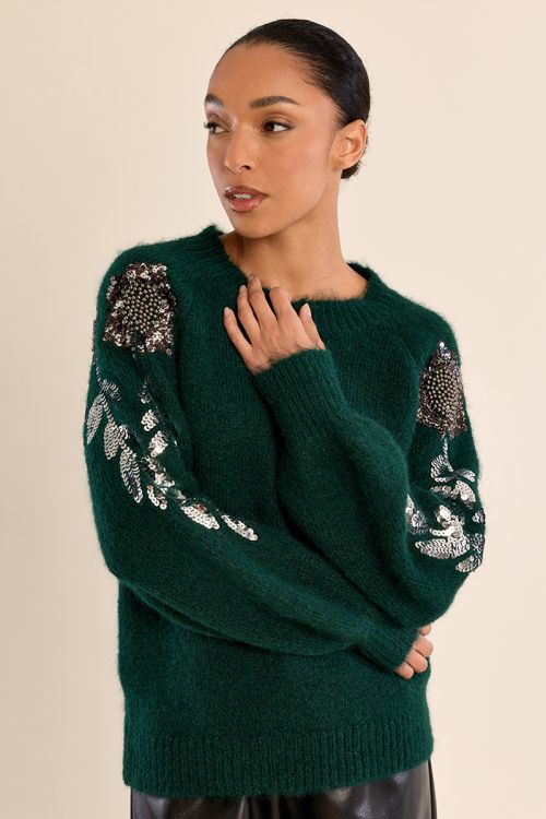 Pull strassé sur les manches