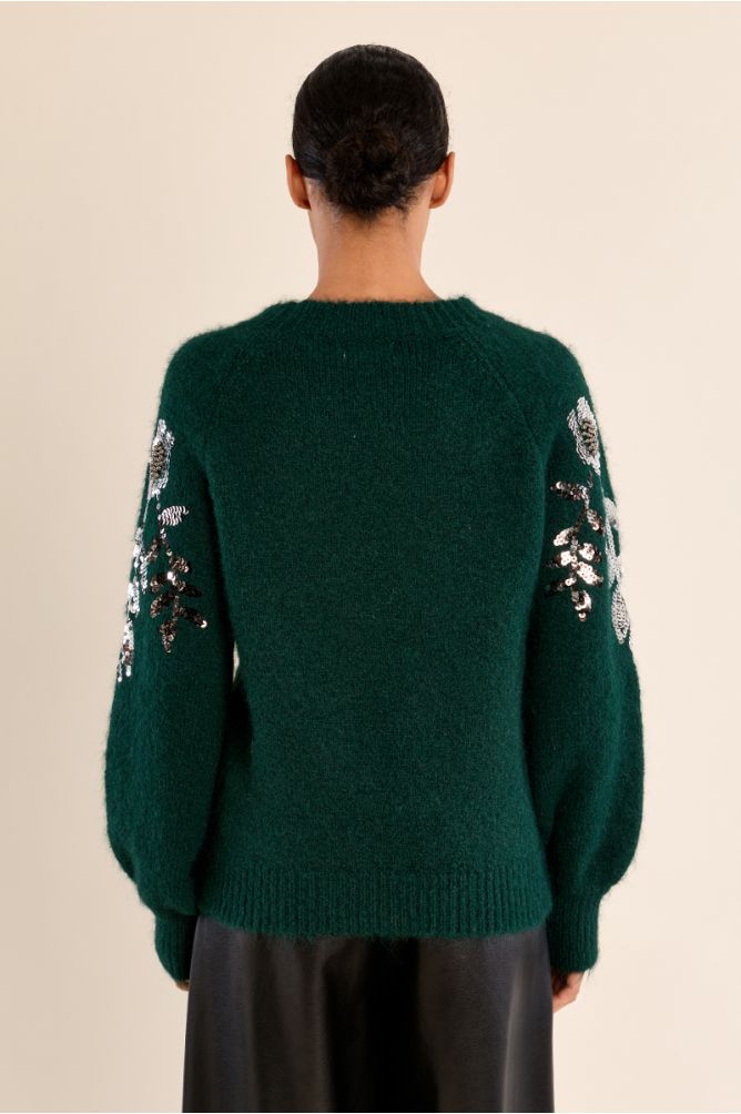 Rhinestone sweater on the sleeves