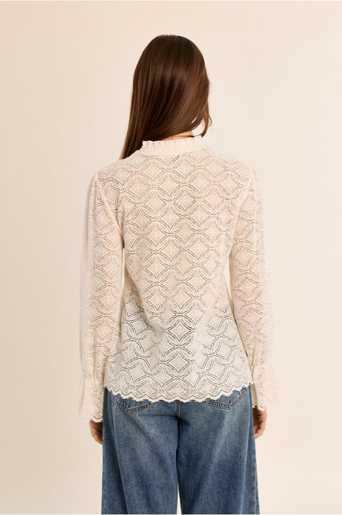 Blouse droite en semi-transparence