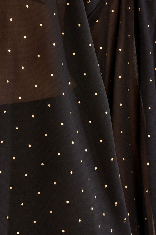 Polka dot blouse in semi-transparency