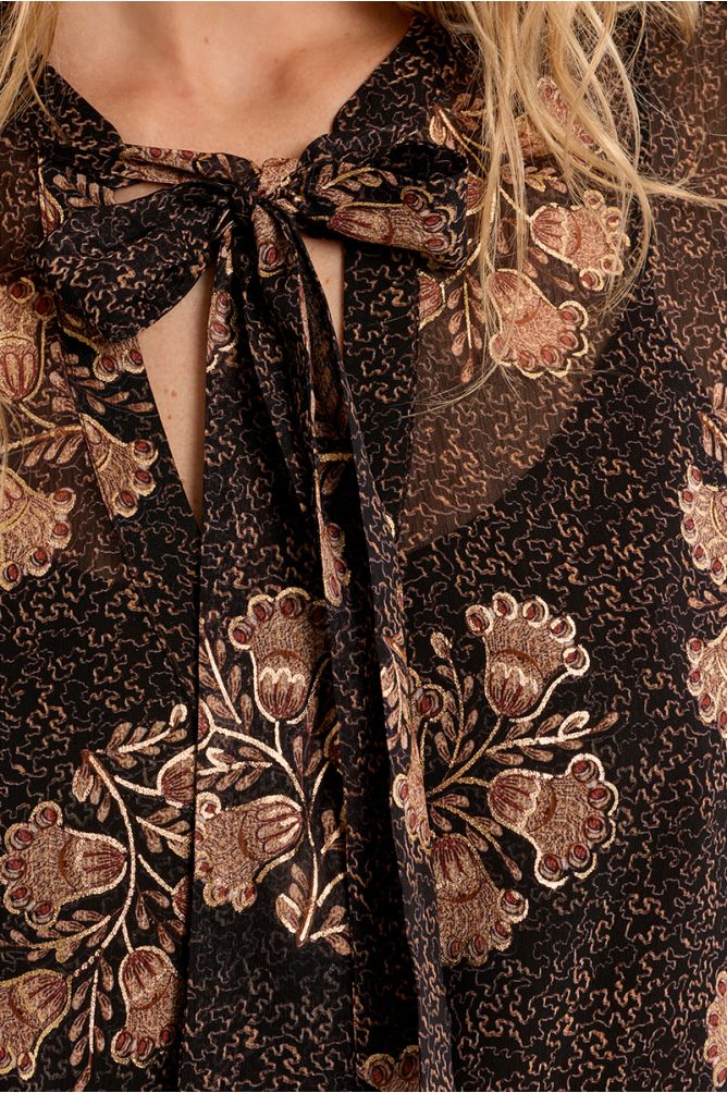 Blouse col lavallière semi-transparente