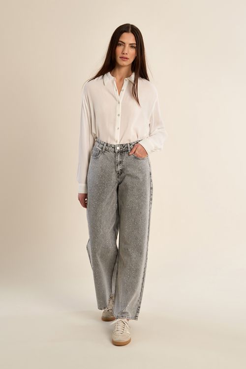 Flared jeans, studded with rhinestones