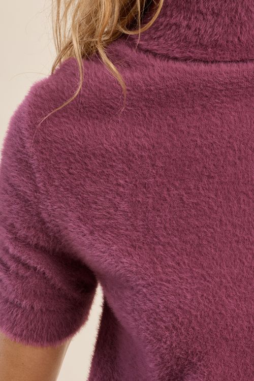 Fluffy, sleeveless sweater