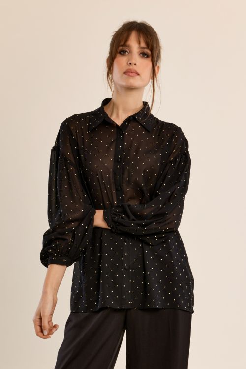 Blouse à pois en semi-transparence