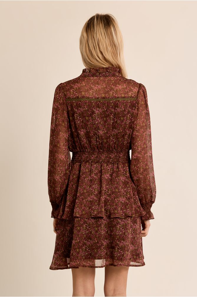 Multi-ruffle dress in semi-transparency