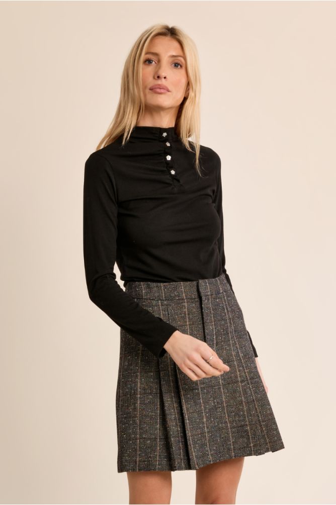 Falda corta plisada con estampado