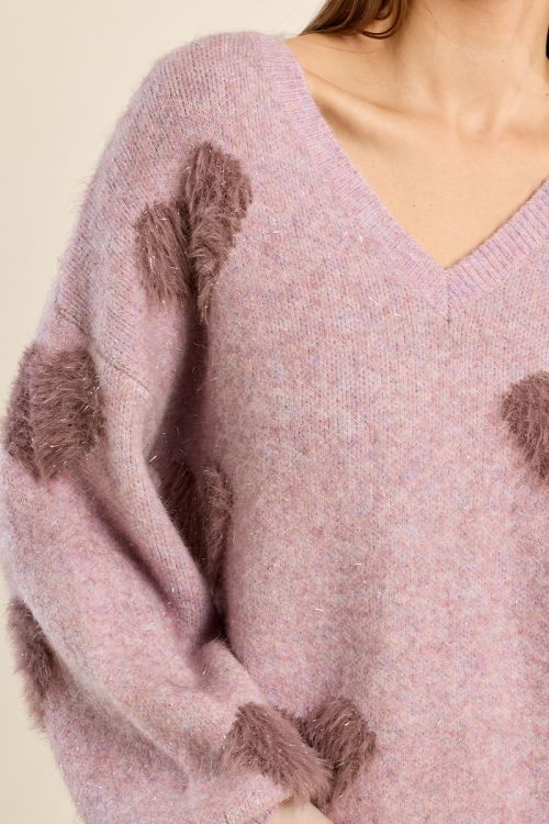 Fluffy sweater with iridescent hearts