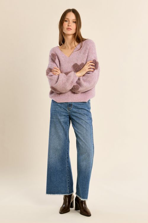 Fluffy sweater with iridescent hearts