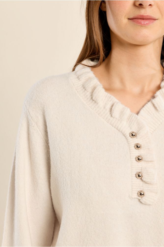 Pull en maille col volanté