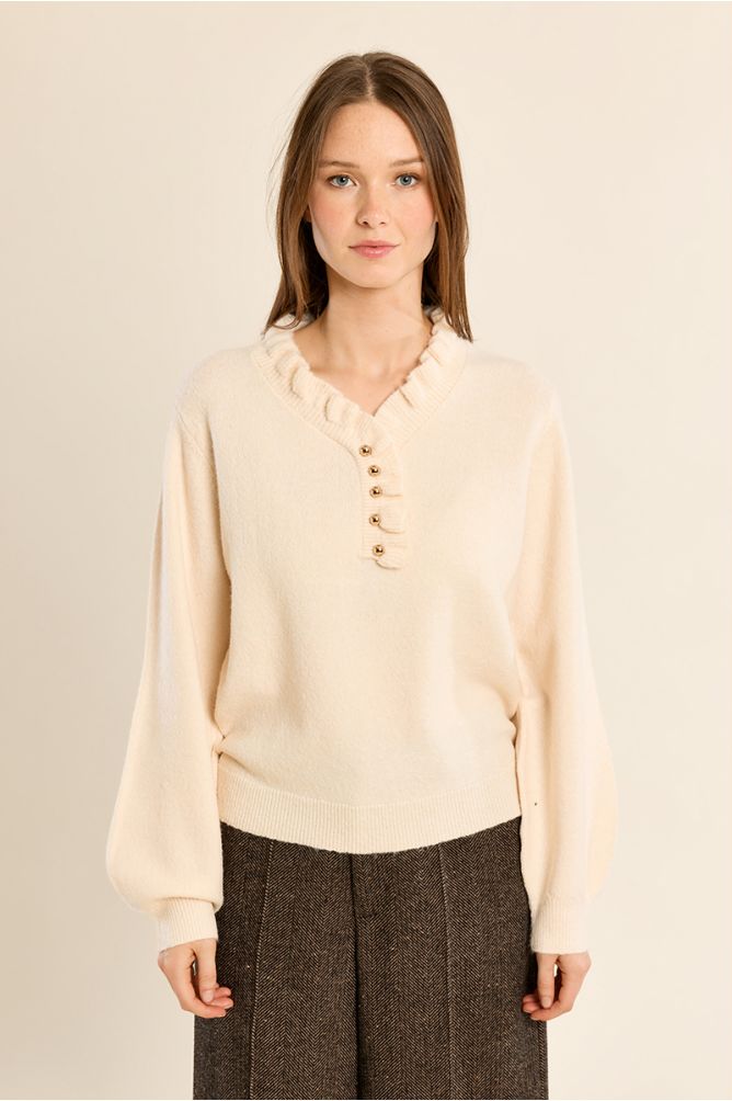 Knitted sweater with ruffled collar