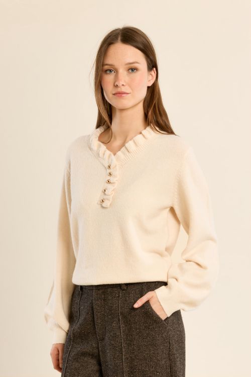 Knitted sweater with ruffled collar