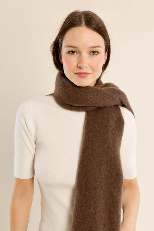 Knitted scarf, fringed