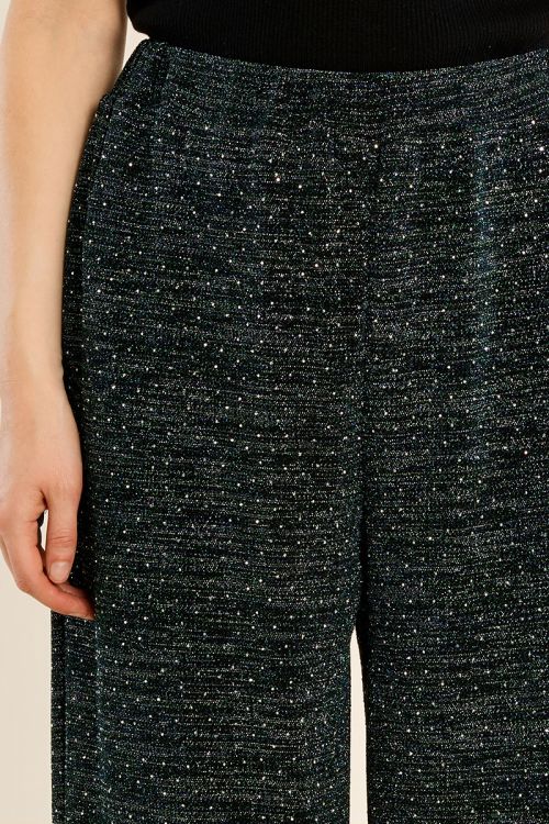 High-waisted trousers, studded with rhinestones