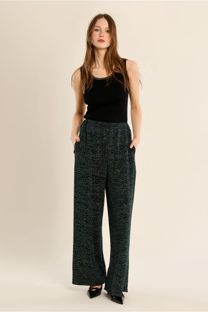 High-waisted trousers, studded with rhinestones
