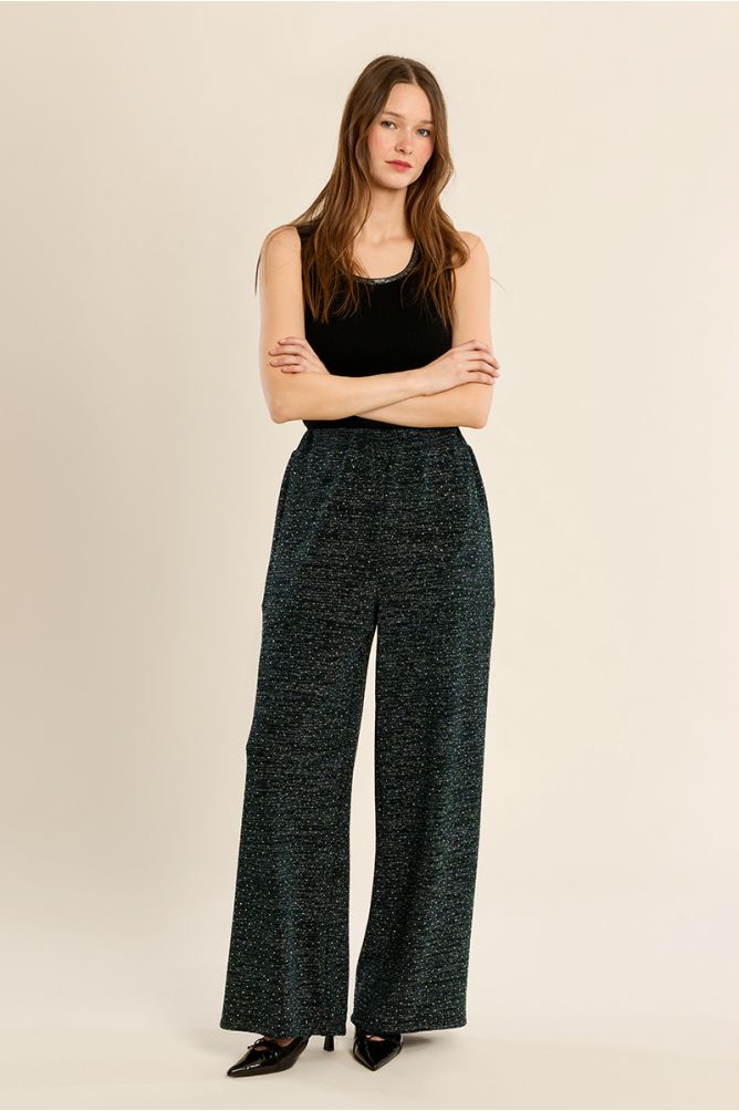 High-waisted trousers, studded with rhinestones