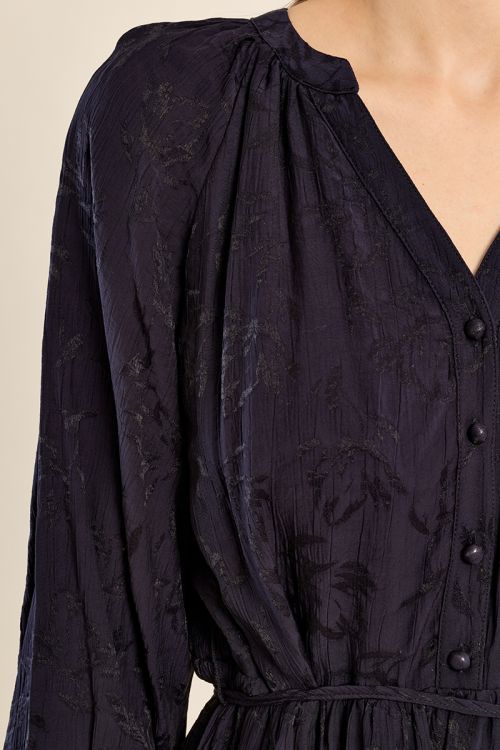 Fitted dress with belted ruffles