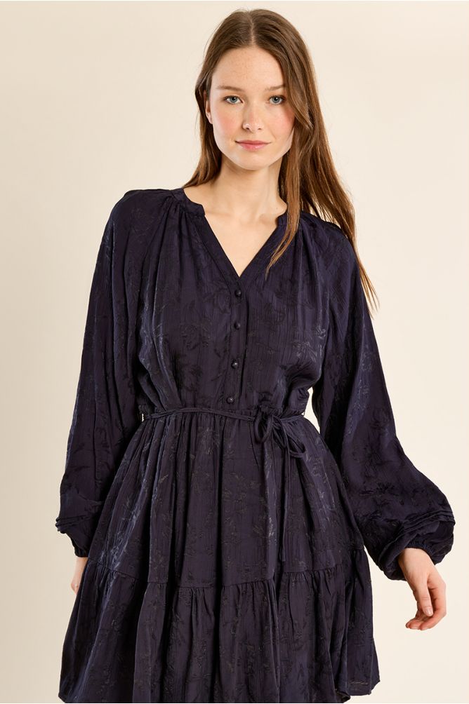 Fitted dress with belted ruffles