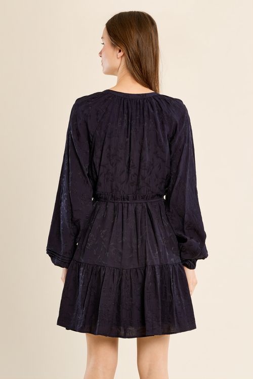 Fitted dress with belted ruffles