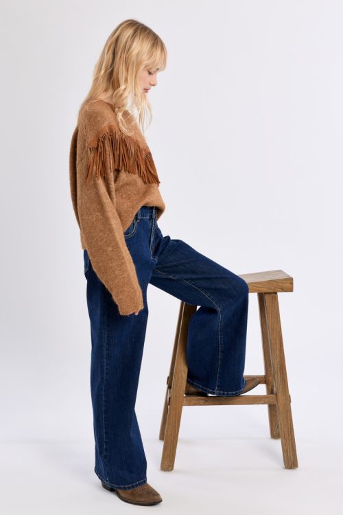 Pull en maille, détail franges