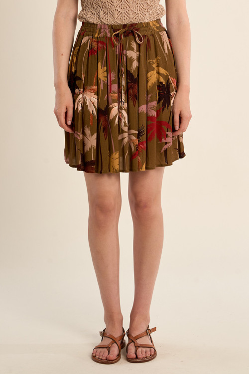 Falda corta, plisada, con estampado.