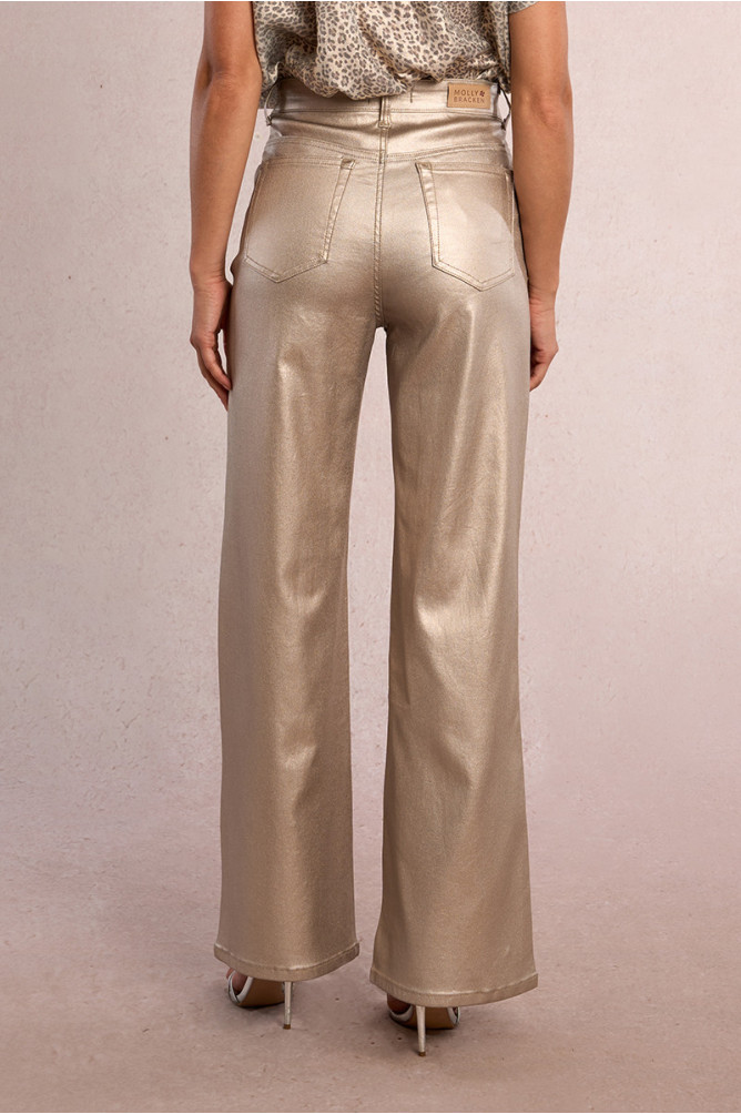Pantalón de mujer largo, en color metalizado.