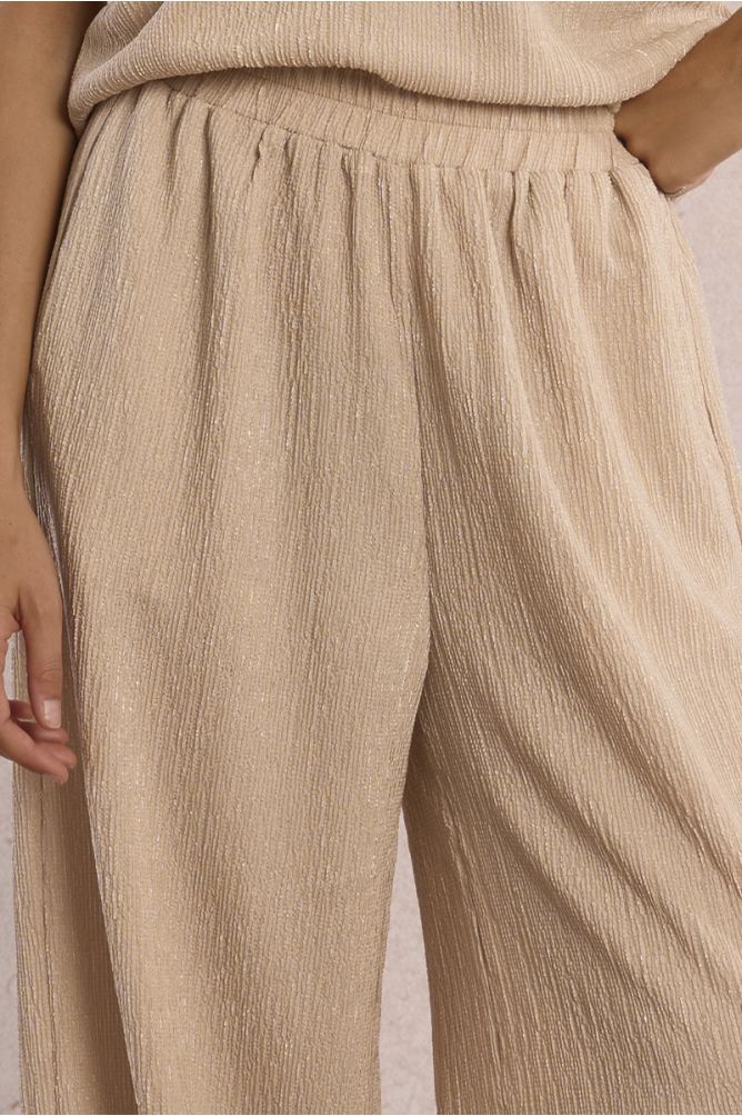 Straight, flowing trousers in semi-sheer