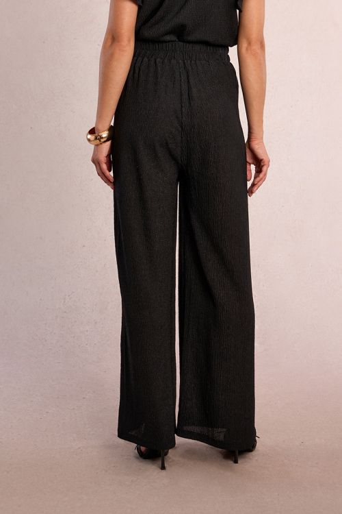 Pantalón de mujer largo, perneras rectas.