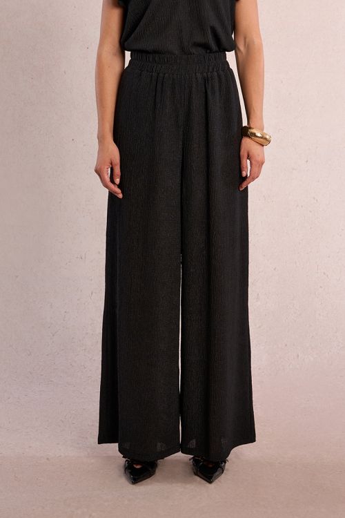 Pantalón de mujer largo, perneras rectas.