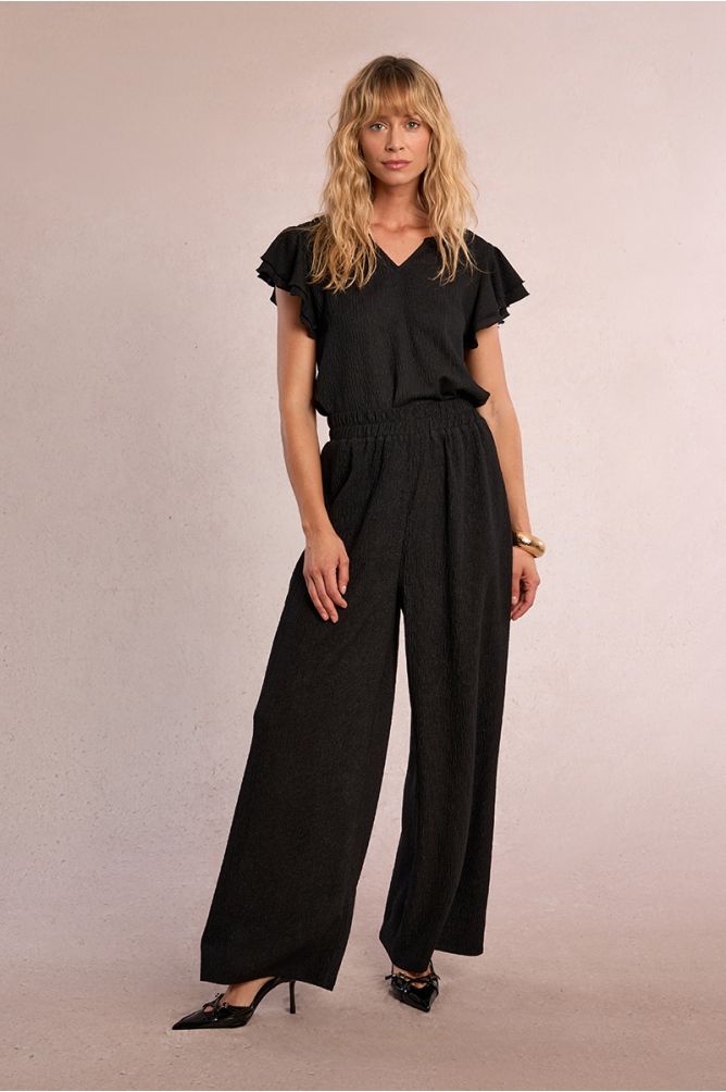 Straight, flowing trousers in semi-sheer