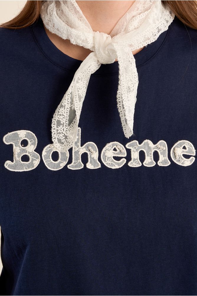Camiseta de mujer de manga corta, con estampado y encaje.
