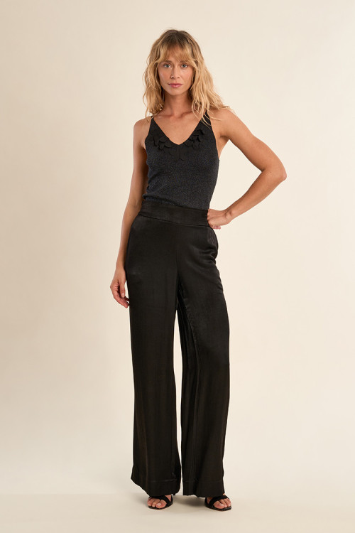 Top de mujer de tirantes, con detalles.