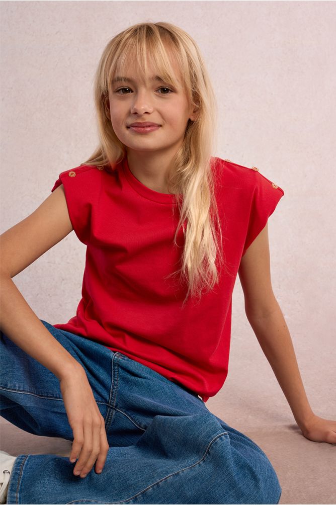Camiseta de niña de manga corta, detalle botones.