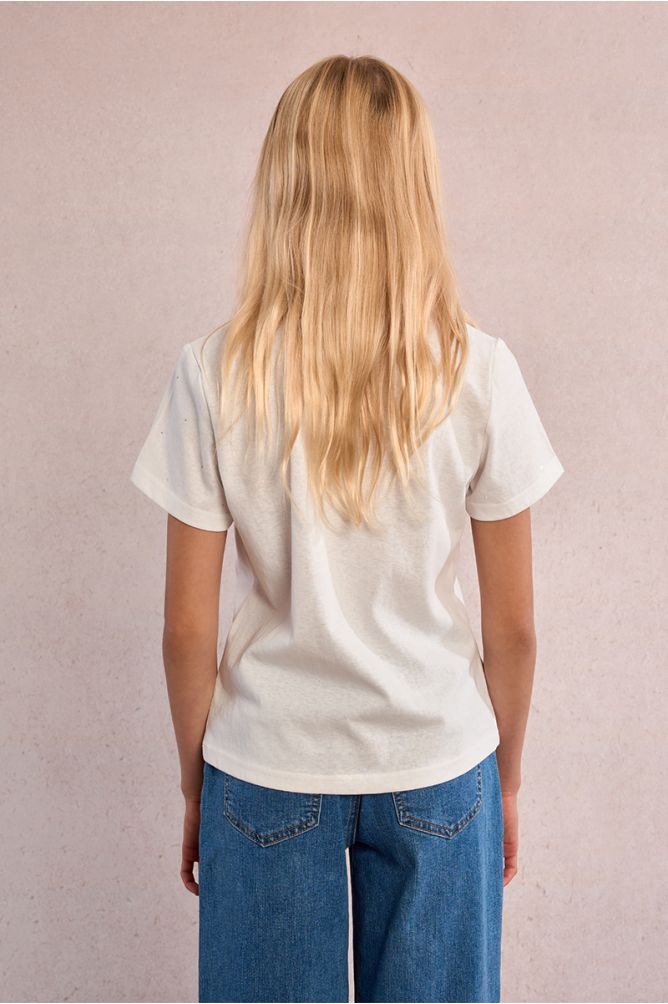 Camiseta de niña de manga corta, detalle lunares.