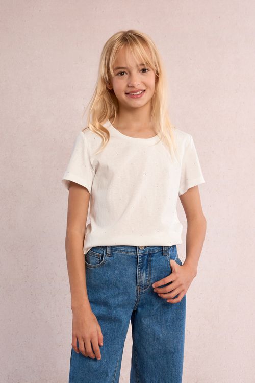 Camiseta de niña de manga corta, detalle lunares.