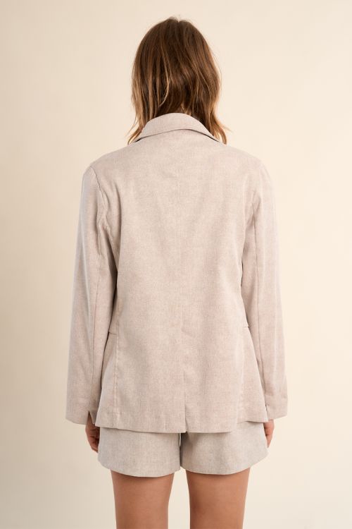 Blazer de mujer de manga larga, bolsillos frontales.