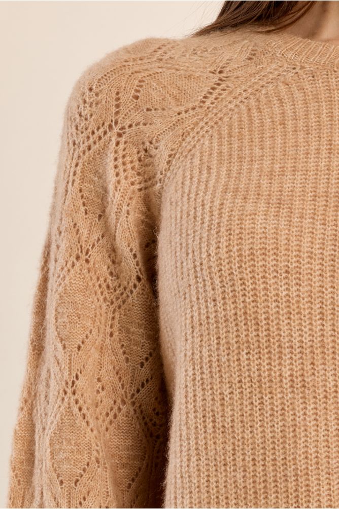 Knitted sweater with openwork sleeves