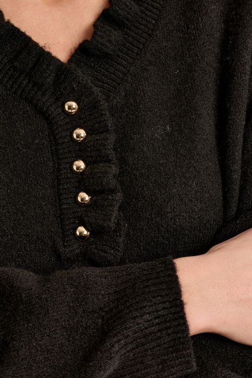 Pull en maille col volanté