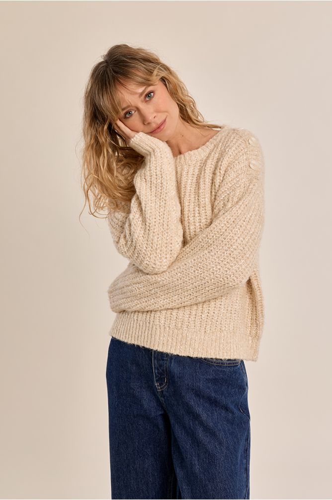 Pull en maille, détail bouton