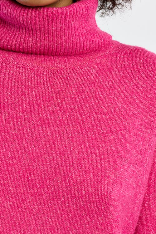 Pull col roulé uni
