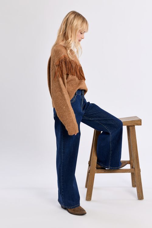 Pull en maille, détail franges