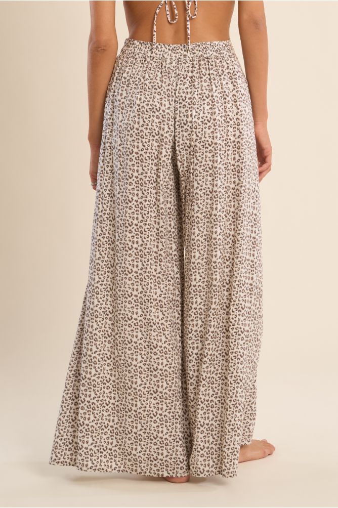 Pantalón de mujer largo, con estampado y lazada.