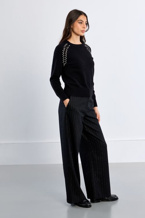 Knitted sweater, openwork embroidery and studs