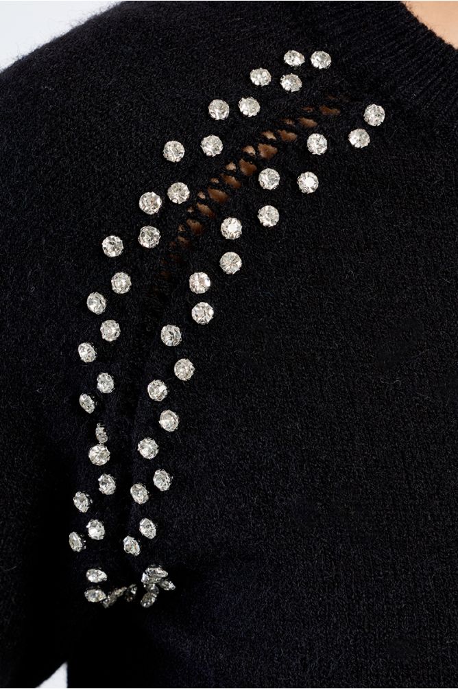 Knitted sweater, openwork embroidery and studs