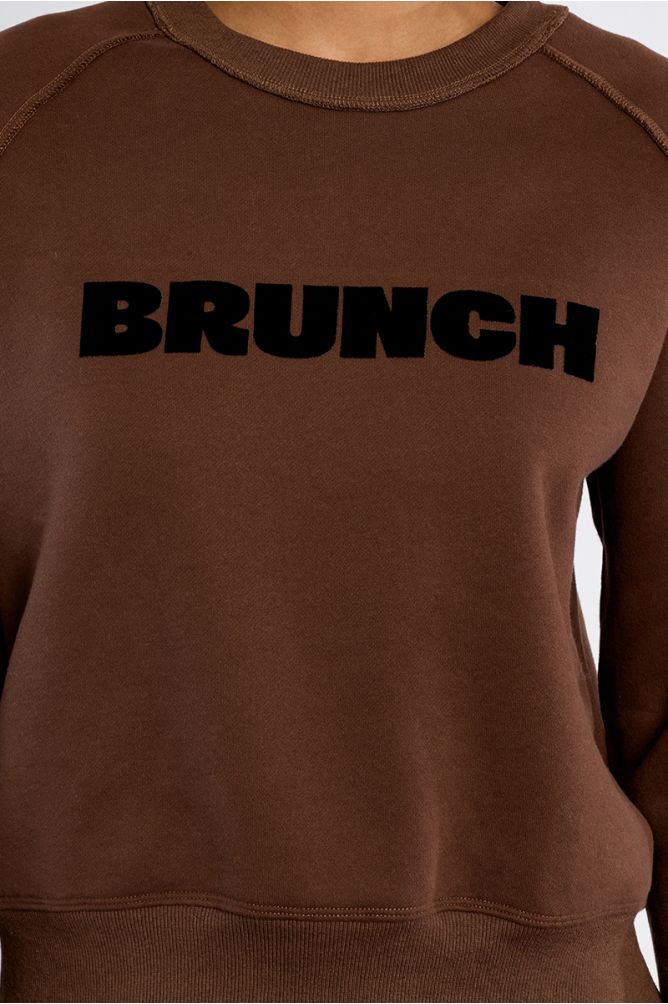 "Sweatshirt with ""Brunch"" inscription"